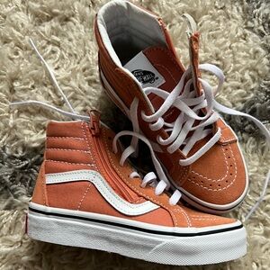 High top side zip vans. Salmon color. Never worn.